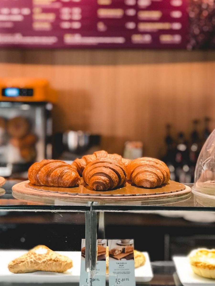 A cafe counter with croissants